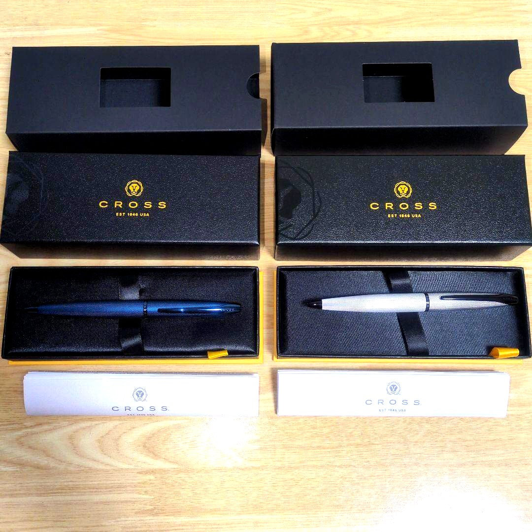 Cross ATX model pens in dark blue and brushed chrome, unused with minor box scratches