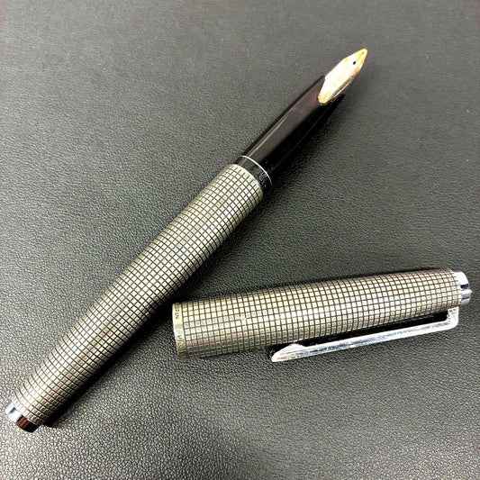 Pilot sterling silver fountain pen with silver body and classic nib shown on white background
