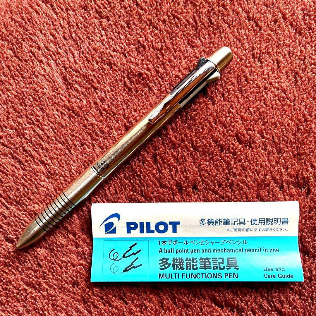Pilot 2+1 Midy multi-function pen with stainless steel body showing rotating mechanism