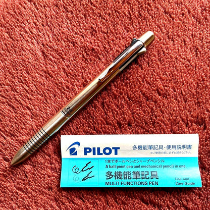 Pilot 2+1 Midy multi-function pen with stainless steel body showing rotating mechanism