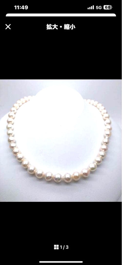 Akoya pearl necklace with 9-9.5mm baroque white pearls having a slight pink tint, 40.5 cm long