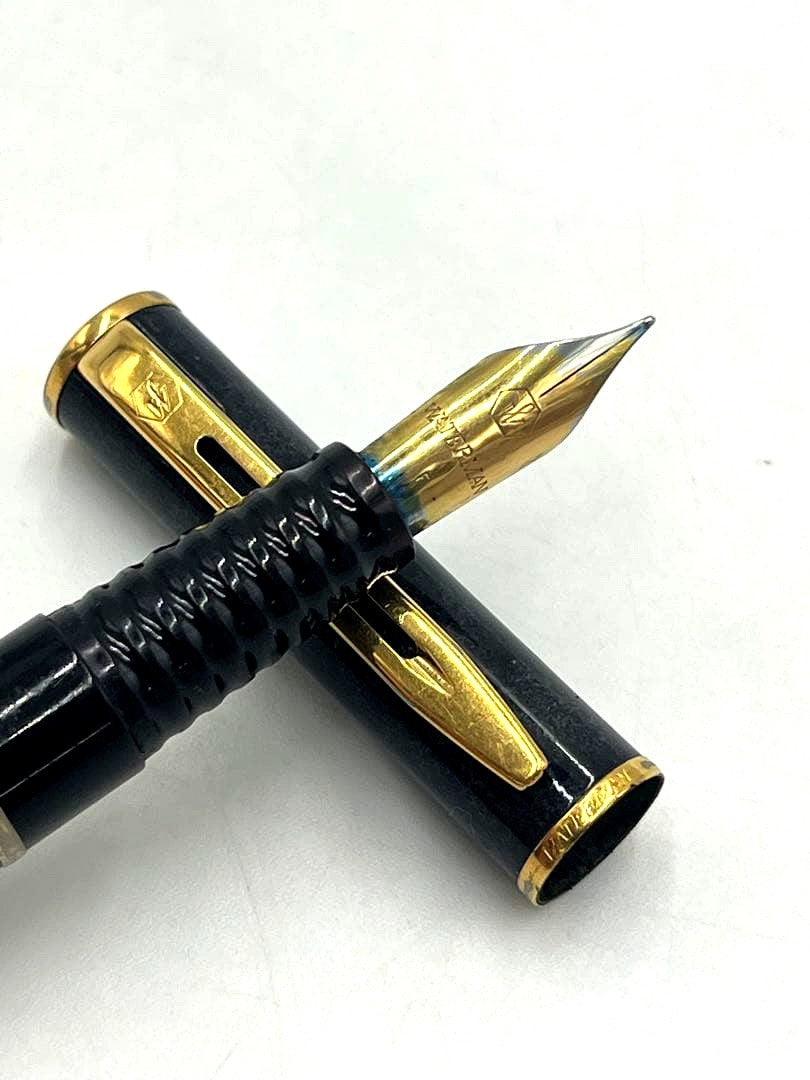 Waterman Fountain Pen Black with fine nib shown from side angle on white background