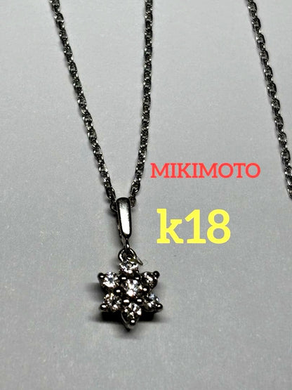 Mikimoto K18 gold necklace featuring a 0.21 carat diamond pendant weighing approximately 2.8 grams