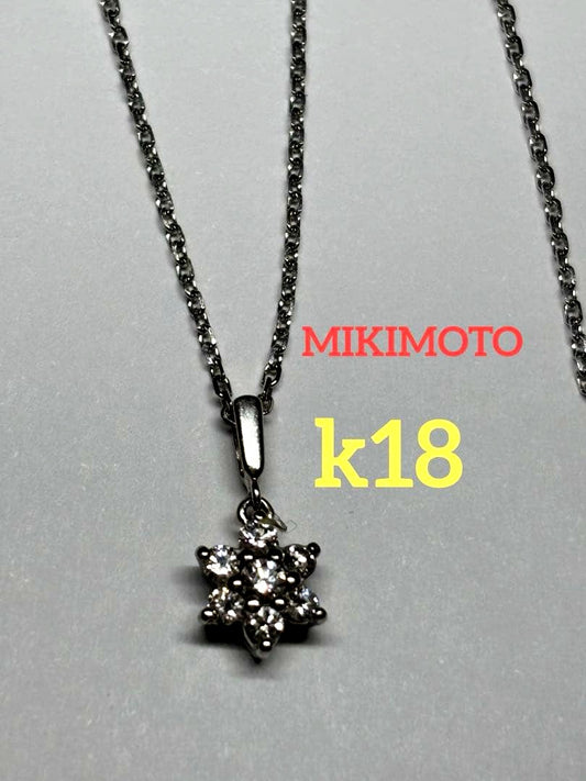 Mikimoto K18 gold necklace featuring a 0.21 carat diamond pendant weighing approximately 2.8 grams