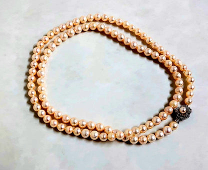 Akoya pearl long necklace with 7-8 mm pinkish white pearls on silver chain, length 81 cm