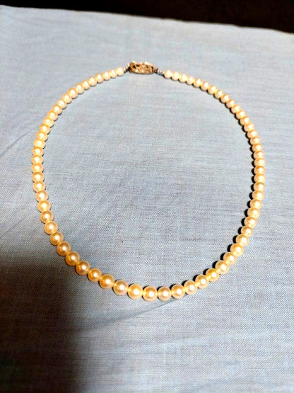 Mikimoto silver necklace with a single 5.8mm genuine pearl pendant weighing 20 grams