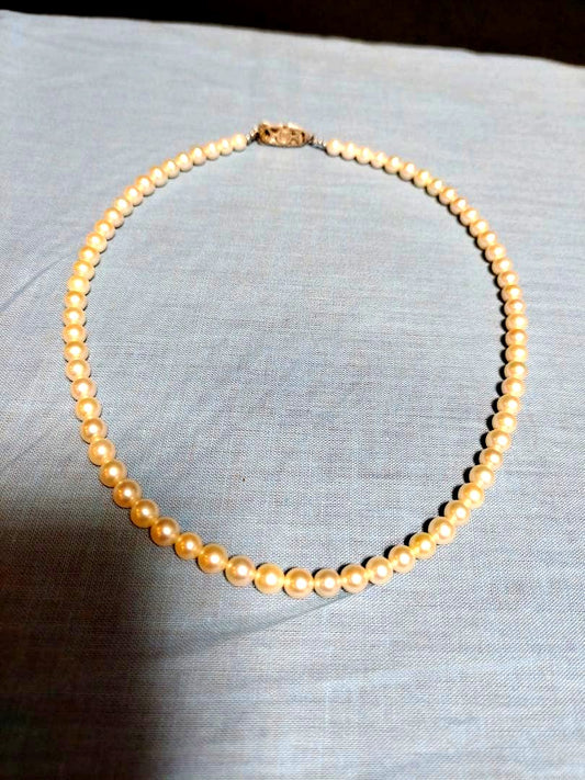 Mikimoto silver necklace with a single 5.8mm genuine pearl pendant weighing 20 grams