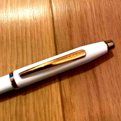 Cross Twist Ballpoint Pen No. 46 with white body and gold metal fittings on white background