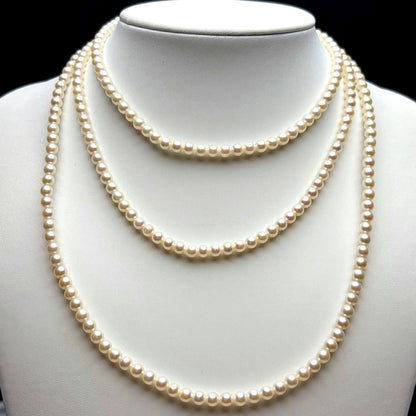 Oyster pearl long necklace 105cm with 2 strands of white Akoya baby pearls and silver clasp
