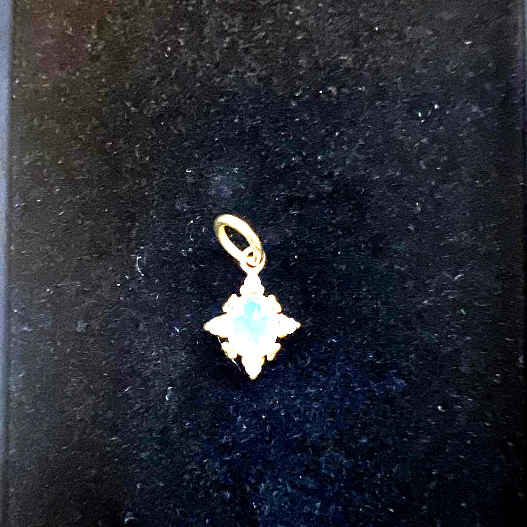 Agete K18 Opal Diamond Charm showing color-changing effect, few times used and clean condition