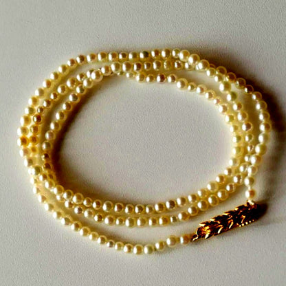 New Akoya pearl necklace featuring very small 3.0-2.0 mm baby mustard seed pearls, 44 cm length