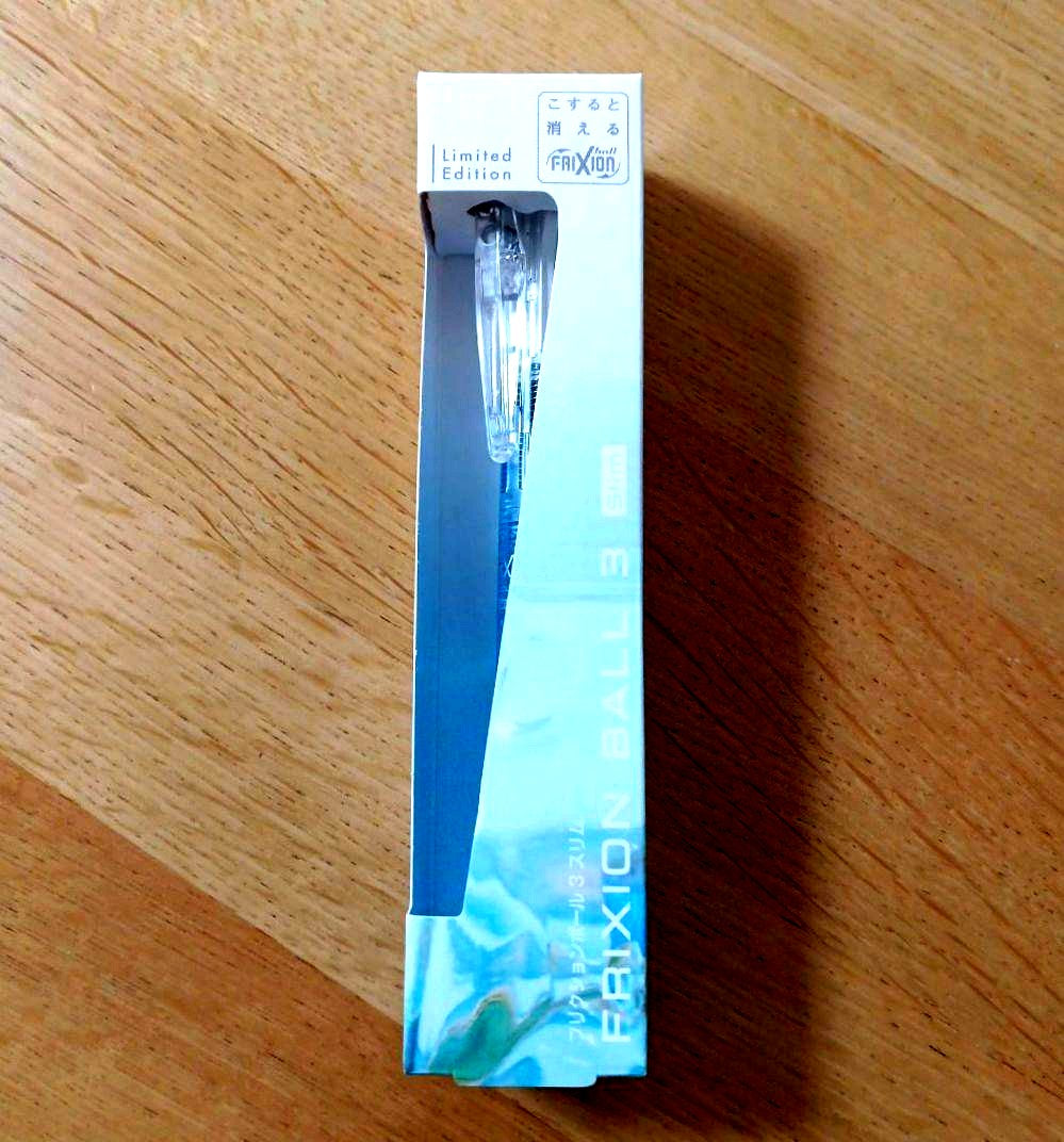 Pilot Frixion Ball 3 Slim multi-color pen with 0.38mm tip and light blue body showing black red and blue ink colors