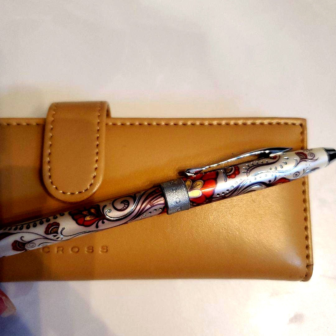 Cross ballpoint pen with paisley pattern design alongside its dedicated beige case