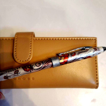 Cross ballpoint pen with paisley pattern design alongside its dedicated beige case