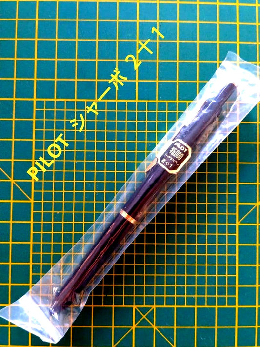 PILOT Sharo 2+1 Pendulum knock-type retro ballpoint pen in black and gold with knock mechanism