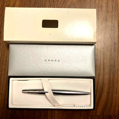 New Cross ballpoint pen with rotating tip and black ink featuring a small English cursive company name