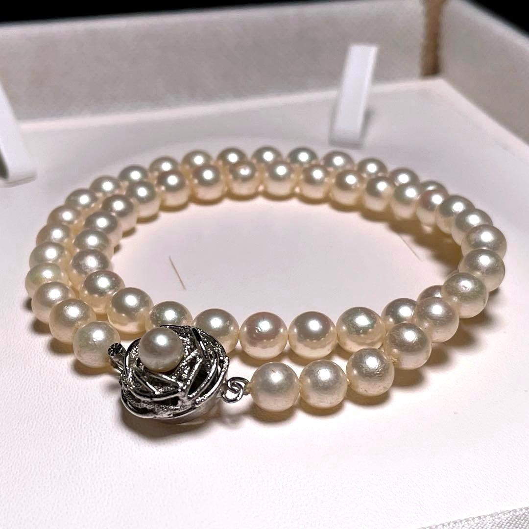 Auspicious Akoya Pearl Necklace with 6.5-7.0mm round white pearls on a silver chain, 40.6cm length