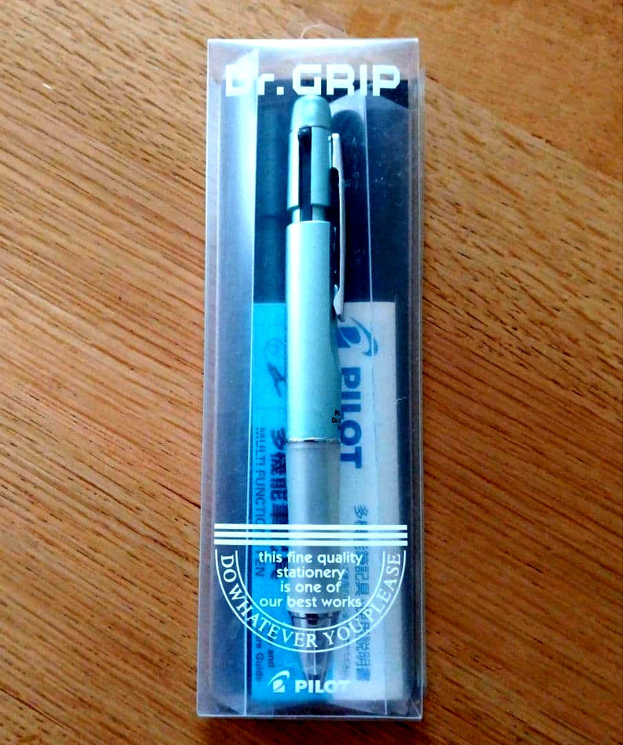 Pilot Dr. Grip 1+1 multi-function pen with metallic light blue barrel and 0.5mm black ballpoint tip