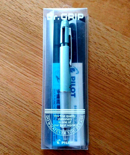 Pilot Dr. Grip 1+1 multi-function pen with metallic light blue barrel and 0.5mm black ballpoint tip