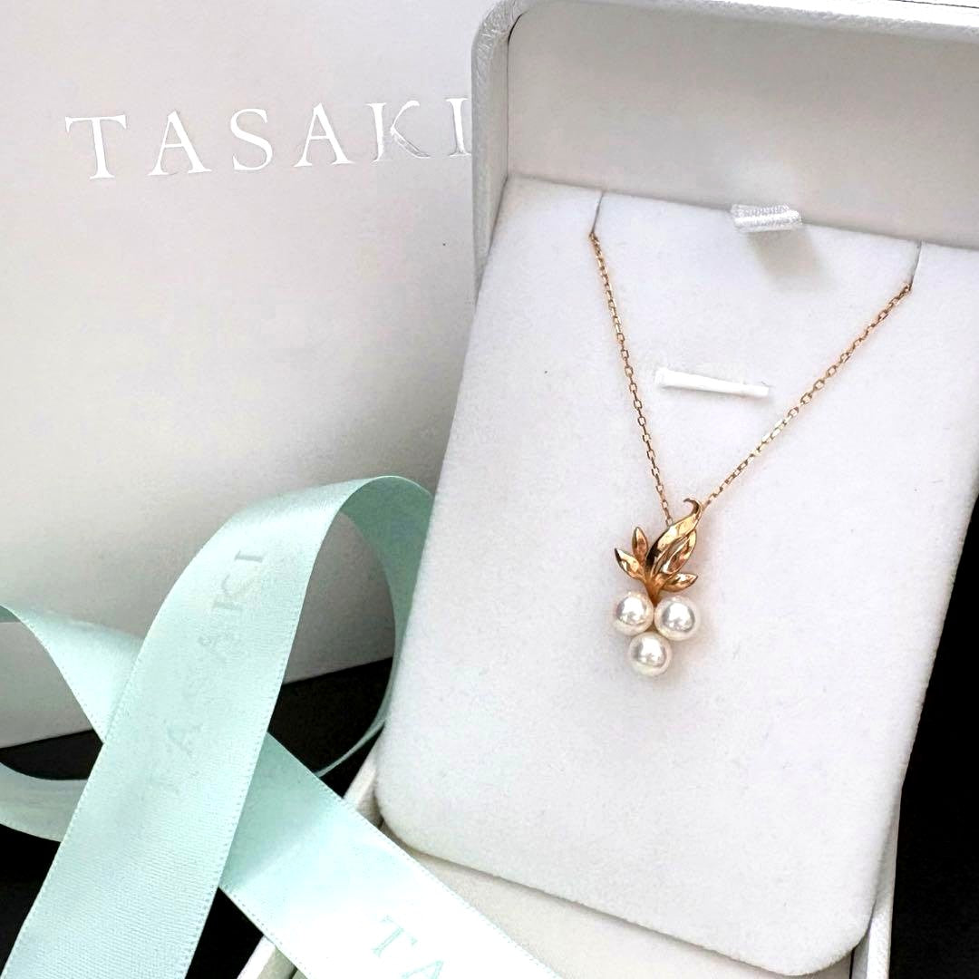 TASAKI Akoya Pearl Pendant Top featuring three 5.1-5.4mm pearls set in 14K gold weighing 1.75g