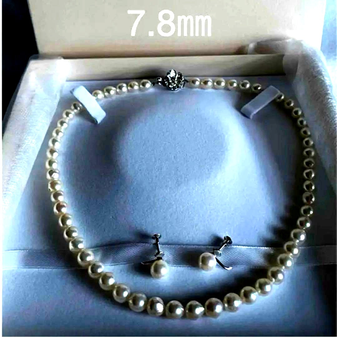 Genuine Akoya pearl necklace with 7.8mm semi-round pearls and matching 7mm pearl earrings in white color