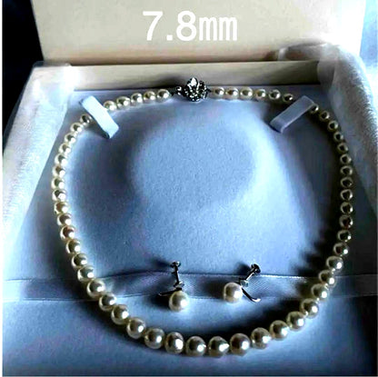 Genuine Akoya pearl necklace with 7.8mm semi-round pearls and matching 7mm pearl earrings in white color