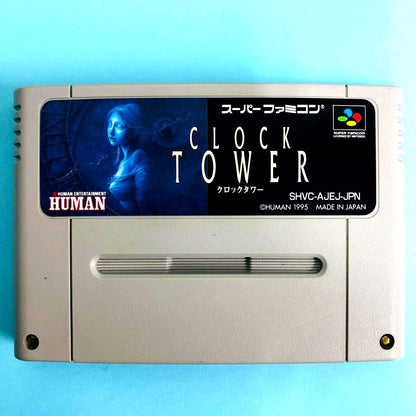 Super Famicom Clock Tower game cartridge with visible scratches and marks