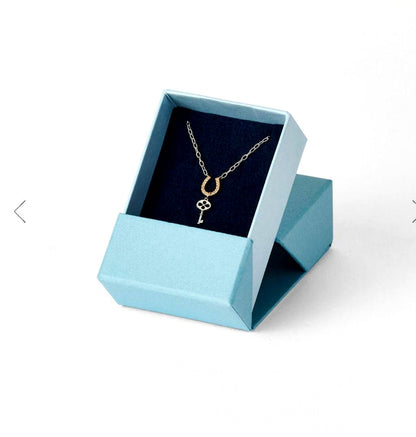 Agete 2026 Limited Edition silver and K10 necklace with charm set featuring a 45cm chain and small detailed charms