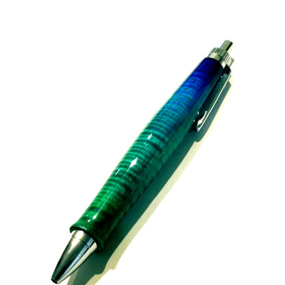 Kiji Wood Axial Pen made from figured Japanese Zelkova wood with a glossy lacquer finish on a white background