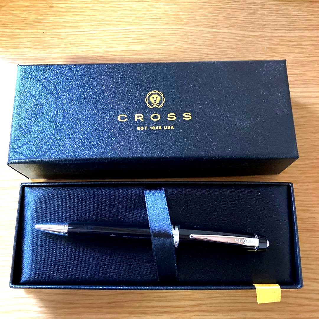 Genuine Cross black ballpoint pen with twist mechanism and one-color ink, shown with its box