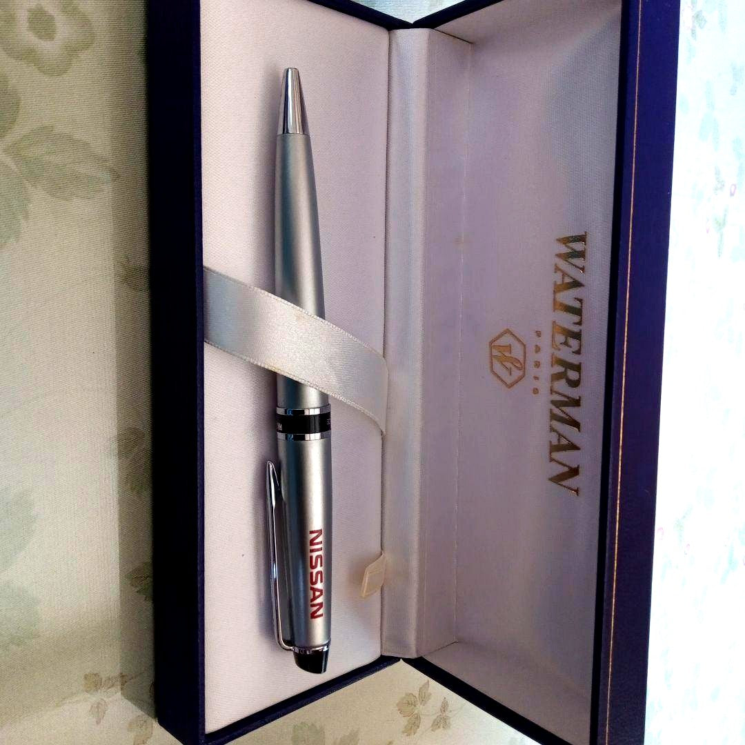 Waterman Nissan Non-Sale Pen with original box showing slight discoloration and ink remaining
