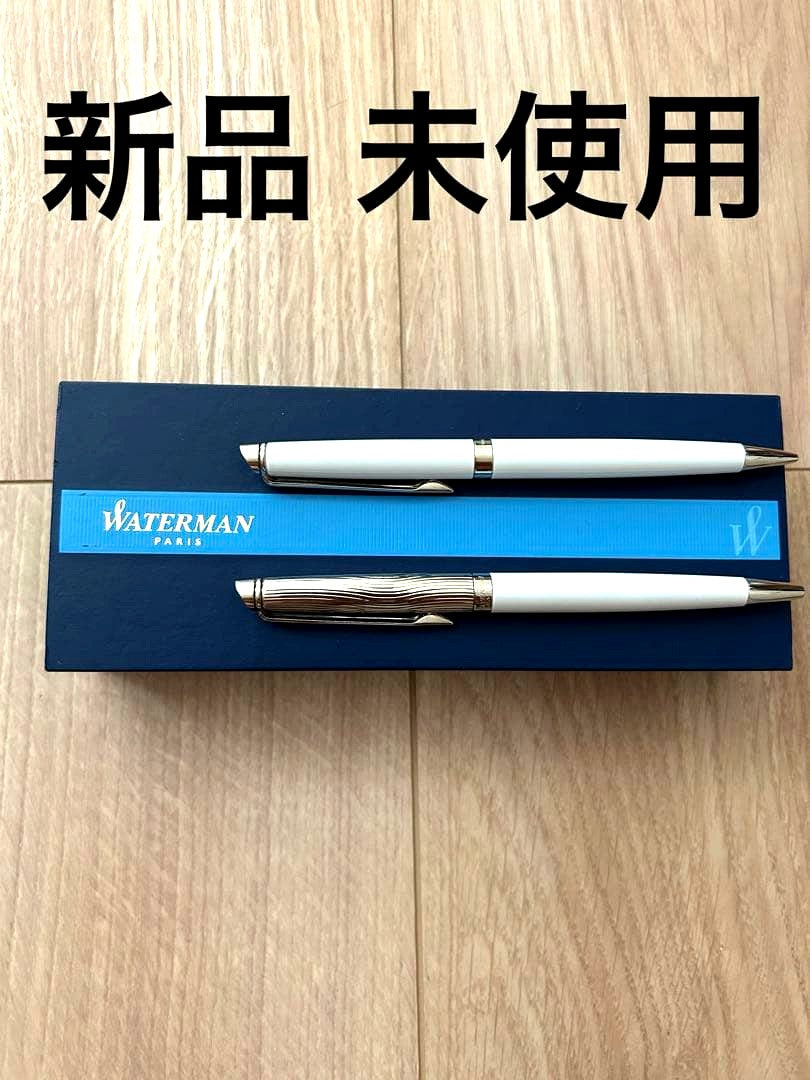 Waterman pen and mechanical pencil set with white bodies and wave-engraved cap