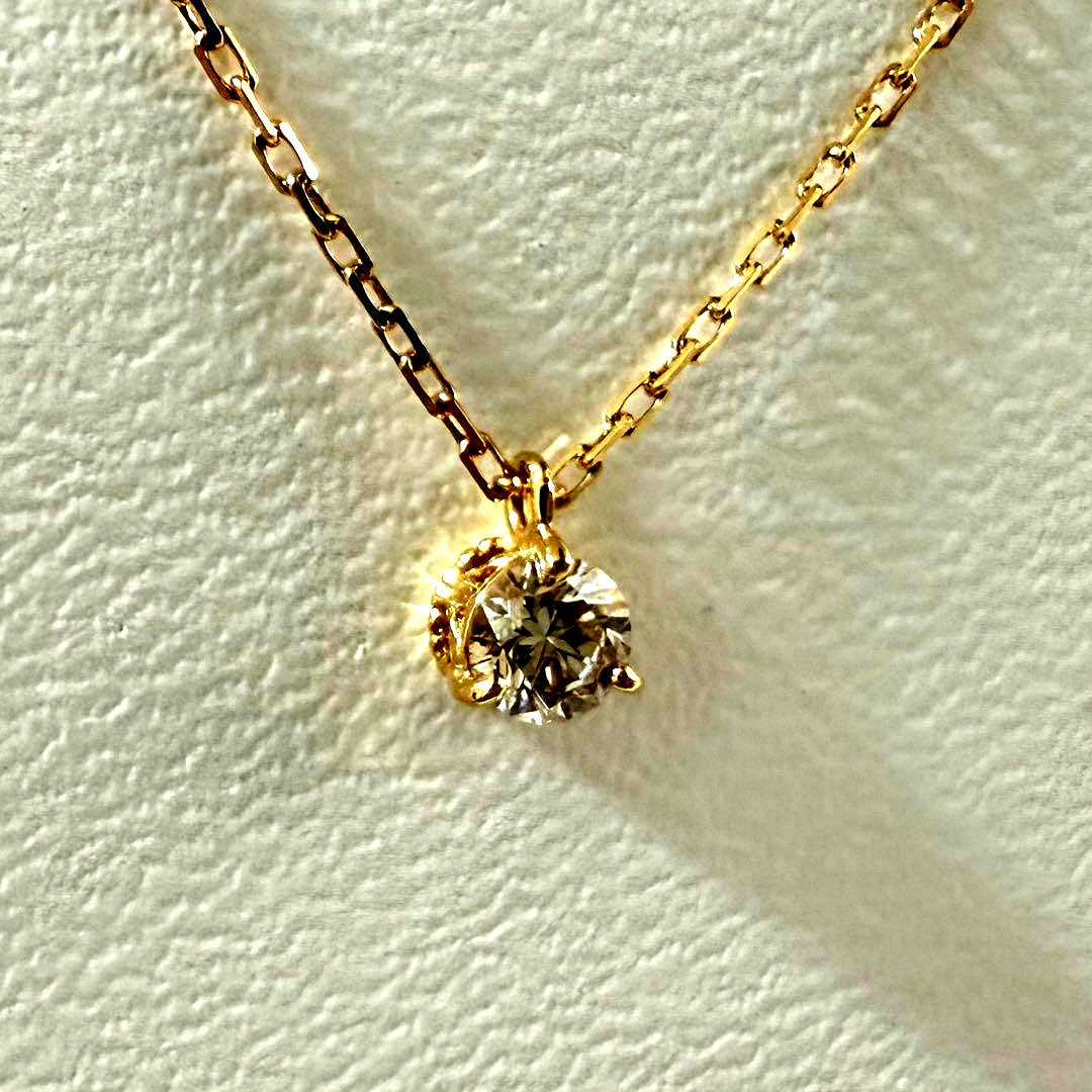 Agete Law K18 yellow gold necklace with 0.08 ct diamond and 40 cm chain displayed on white background