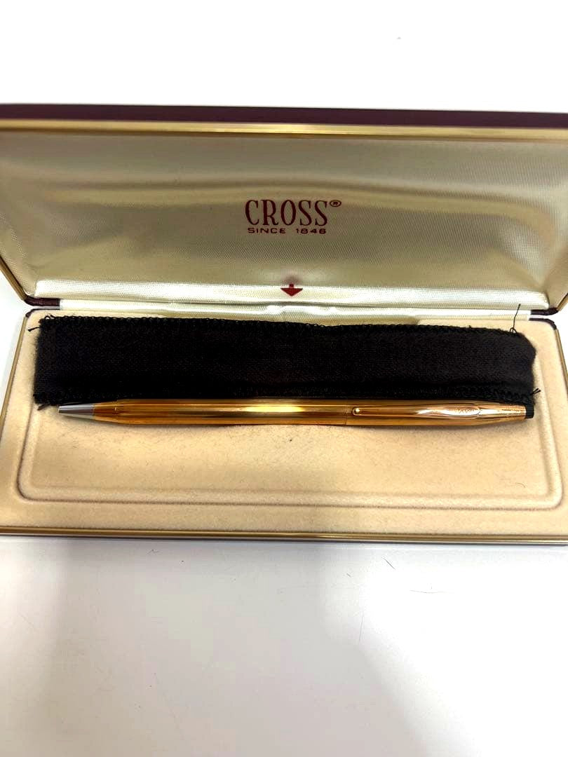 CROSS Gold Ballpoint Pen with shiny gold finish and dedicated protective case