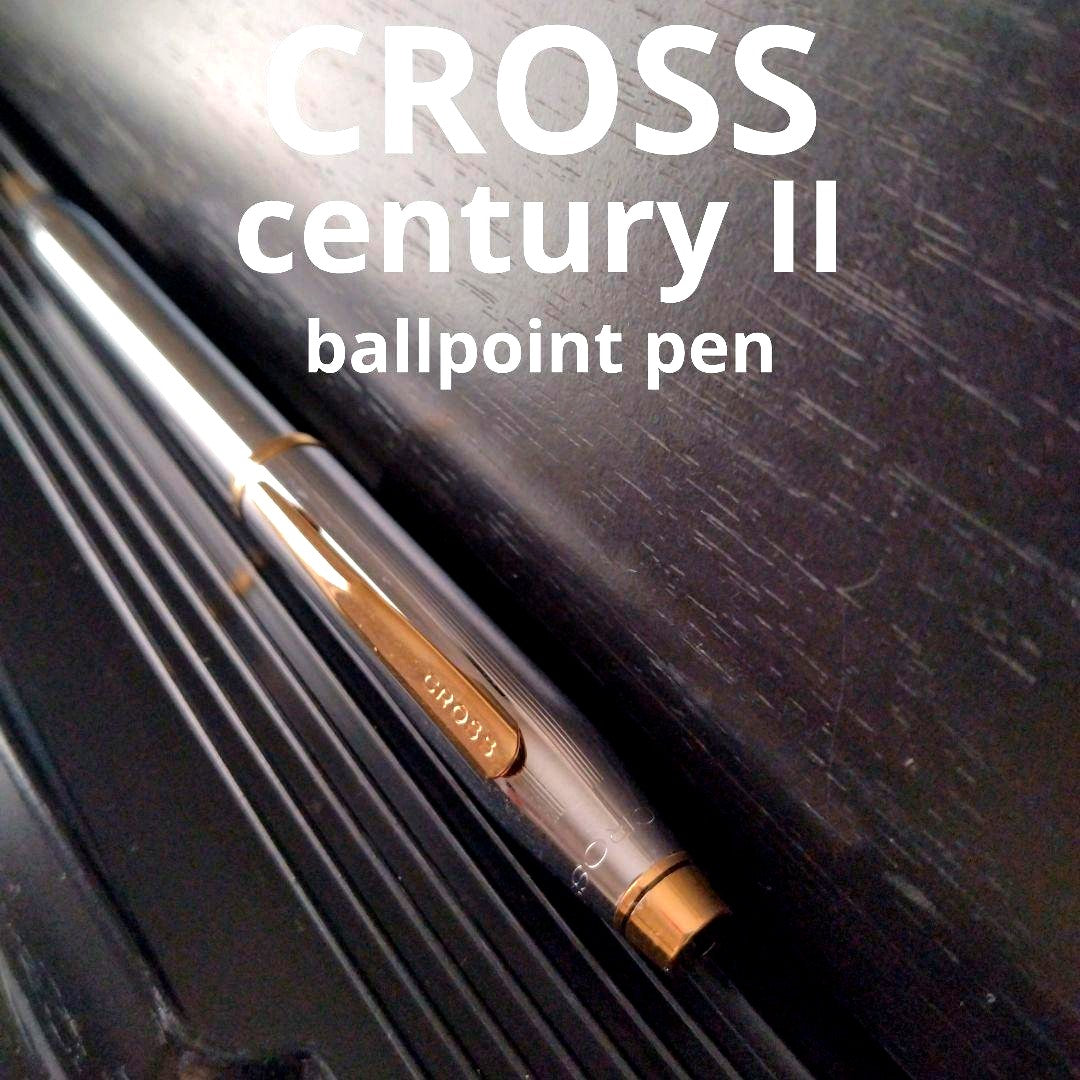Cross Century II oil-based ballpoint pen with silver and gold brass body and medium black ink