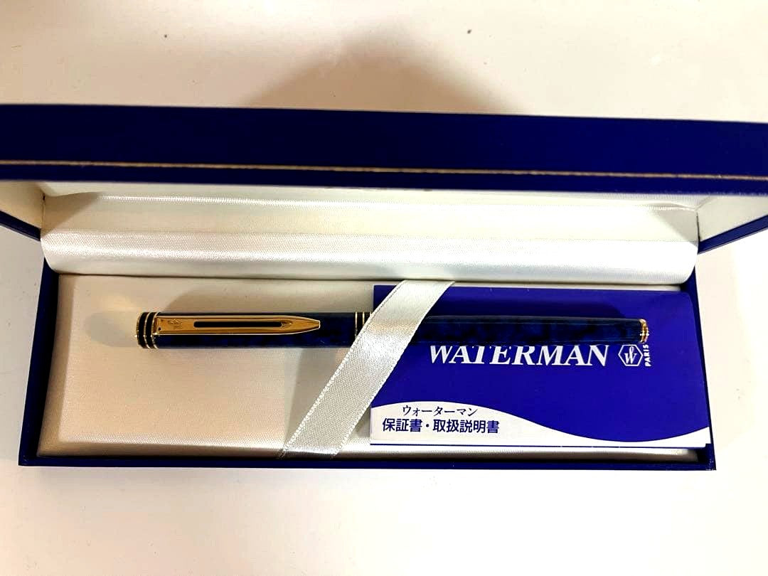 Waterman fountain pen with sleek design, uncapped showing nib, black body