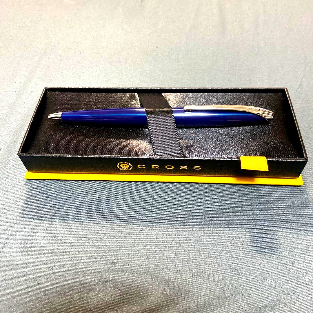 Cross blue ballpoint pen with silver clip shown with its dedicated black case