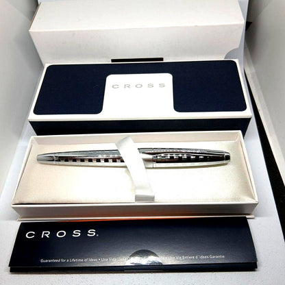 Cross brand silver metal ballpoint pen with stripe design shown in dedicated case without refill