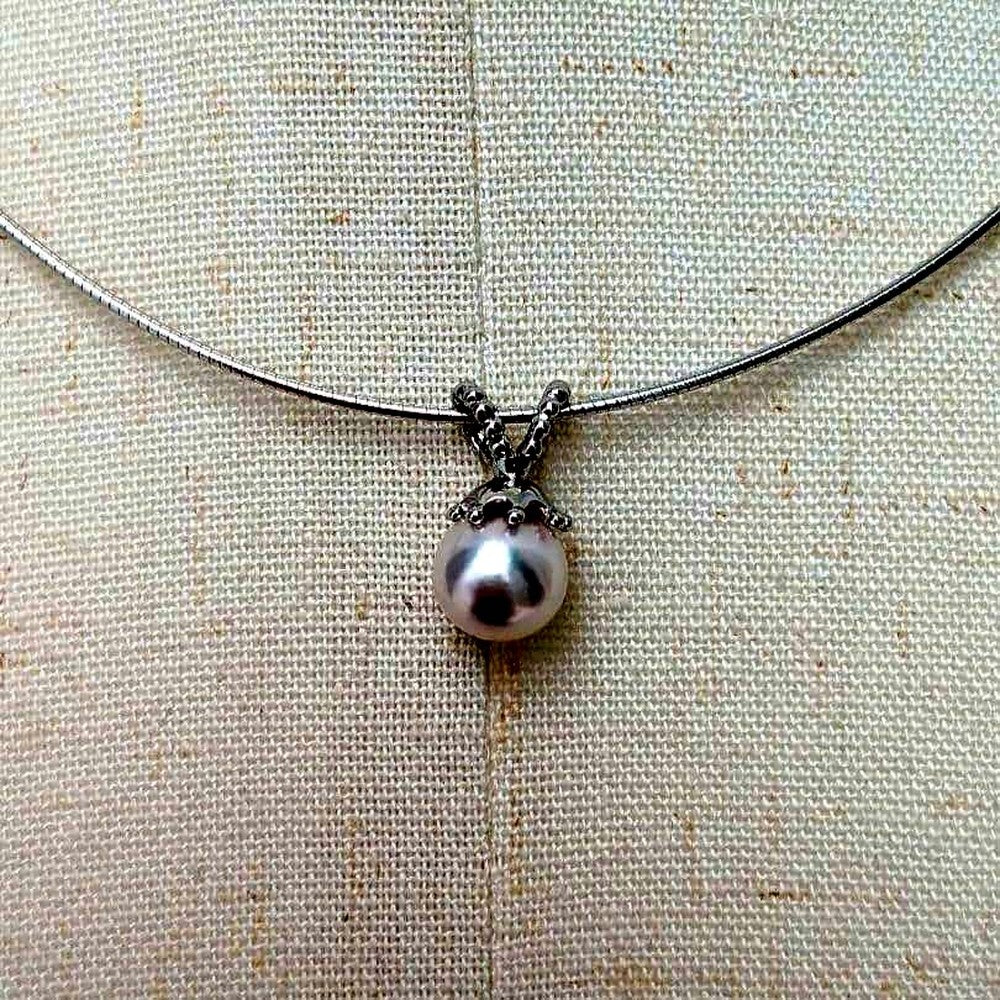 Akoya pearl necklace with 8mm pearls on silver omega chain approximately 45cm long with silver clasp