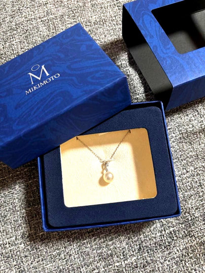 Mikimoto 7.6mm white Akoya pearl pendant in 18K white gold with little bean chain and box
