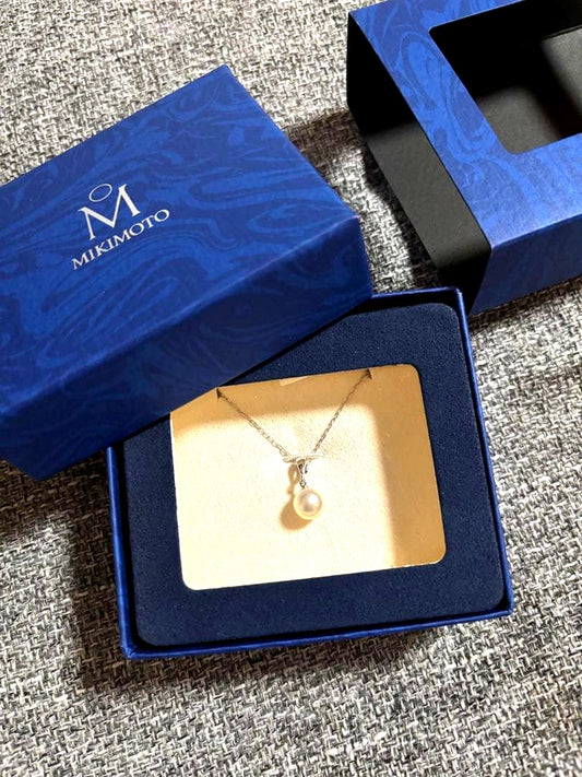 Mikimoto 7.6mm white Akoya pearl pendant in 18K white gold with little bean chain and box