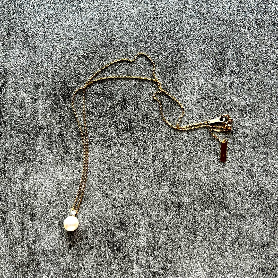 TASAKI single pearl diamond necklace featuring a single pearl and diamond pendant on a 44 cm chain