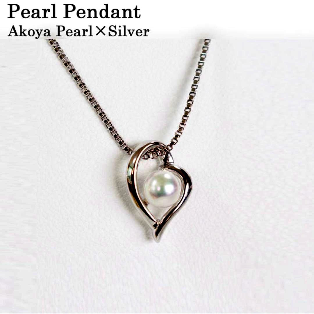 Baby pearl pendant featuring a 5mm Akoya pearl with silver frame and 40cm silver chain in white pink tone