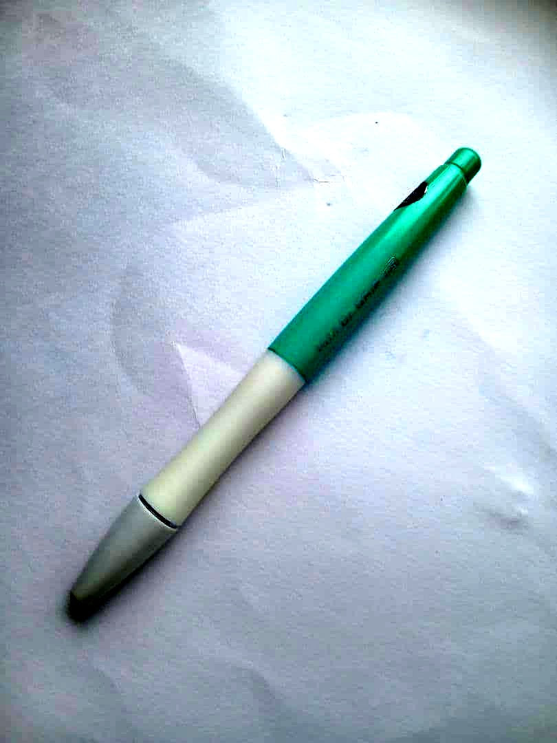 Close-up of a discontinued PILOT Dr.GRIP antibacterial ballpoint pen with visible logo and grip