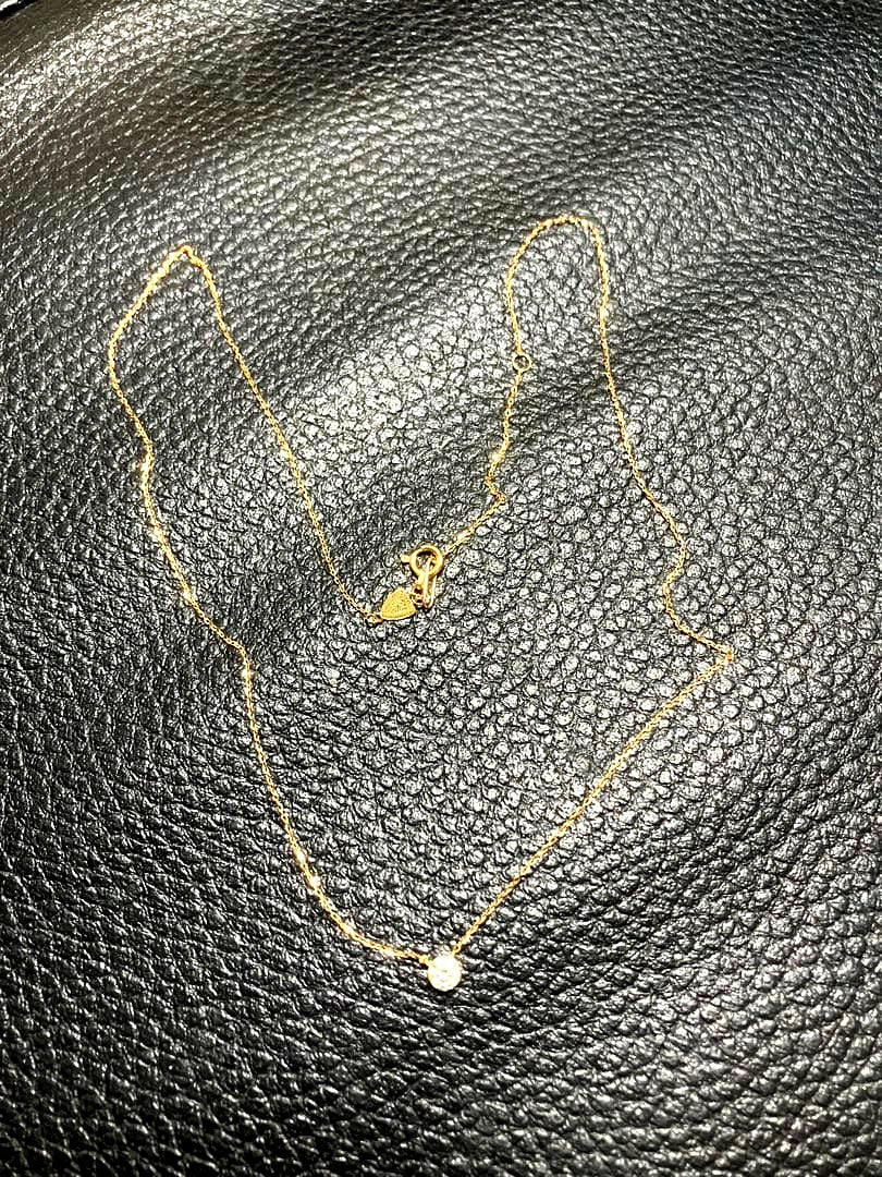 18k gold chain necklace by agete, gently used with a sleek and elegant design