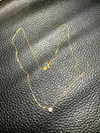 18k gold chain necklace by agete, gently used with a sleek and elegant design