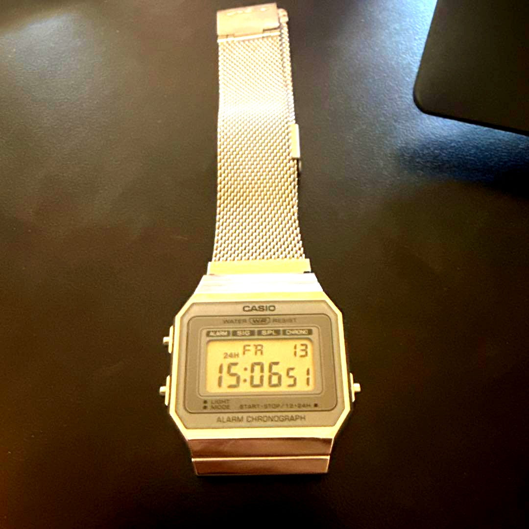 Casio Digital Watch with stainless steel mesh band featuring alarm and chronograph functions