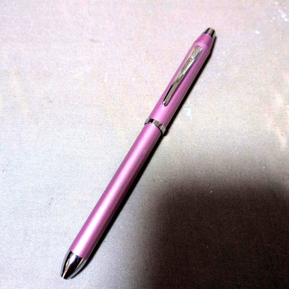 Cross multifunction pen in pink with sharp pencil and ballpoint features shown on white background