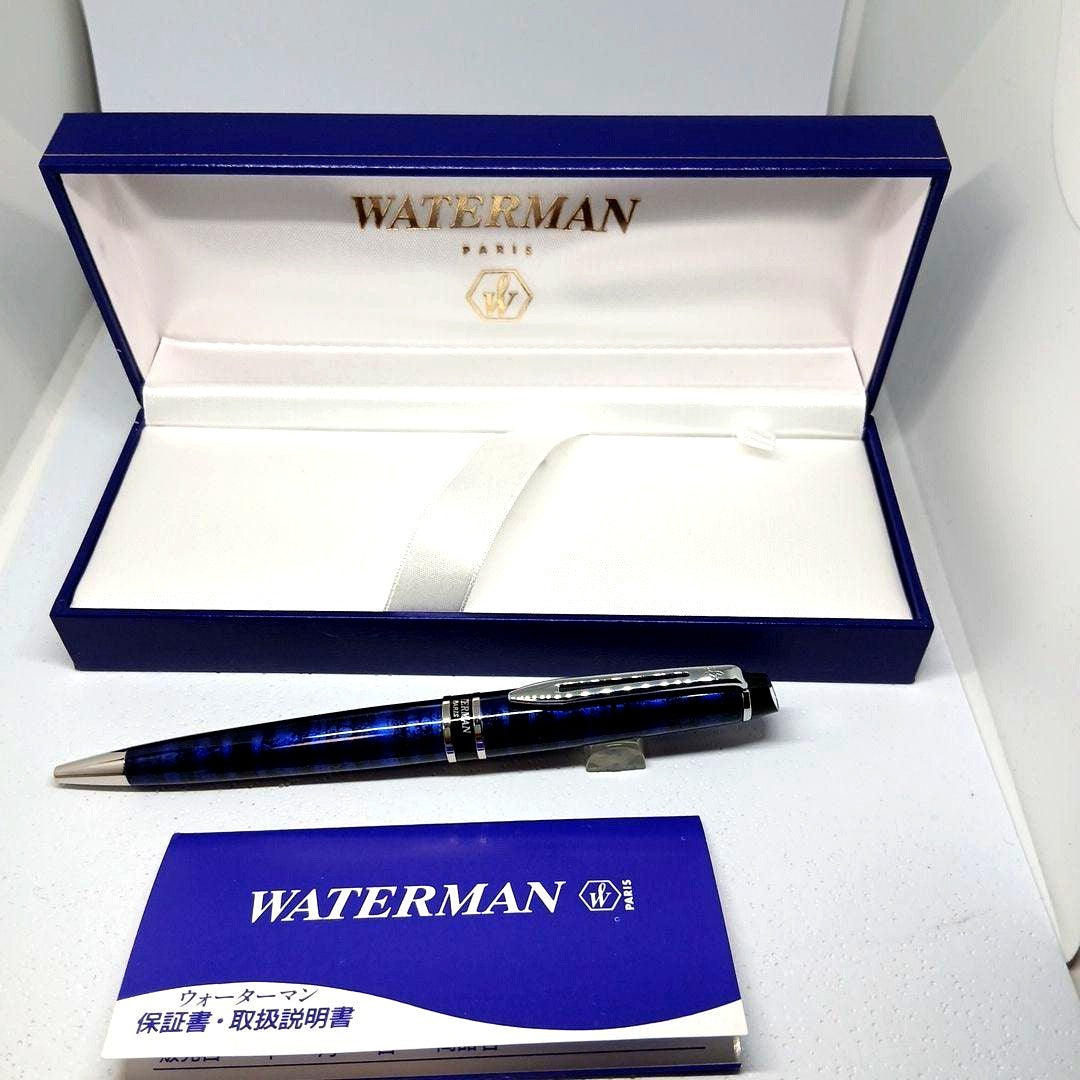 WATERMAN Expert Blue Marble ballpoint pen in blue metal with stripe pattern shown with box and manual
