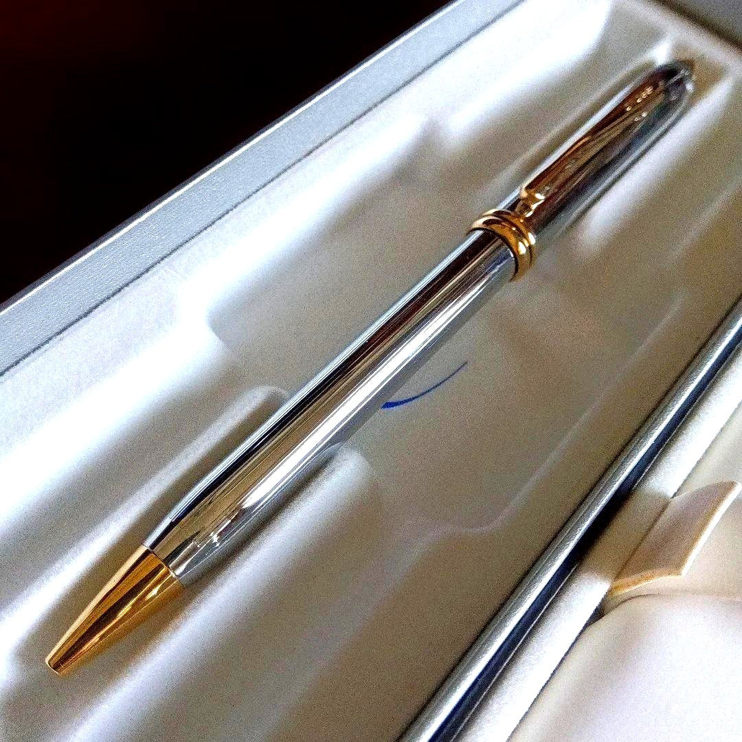 CROSS Townsend silver and gold combination ballpoint pen with black refill, Japanese import, shown on white background